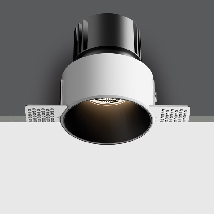 10107BT/B/V: 6,5W CCT Variable LED Trimless recessed downlight, IP54.   Requires 700mA constant current driver.  ..